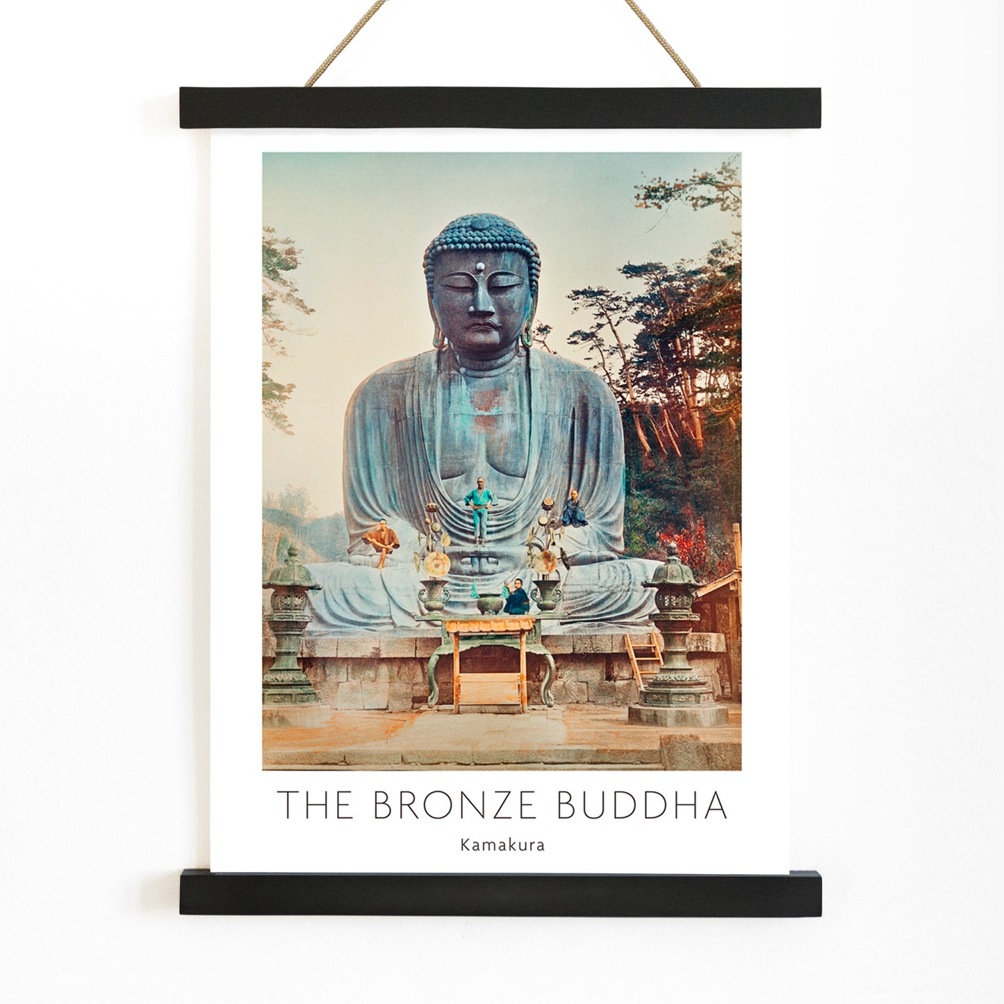 Bronze Buddha at Kamakura by Kazumasa Ogawa large outdoor statue with trees and altar in background, with wooden magnetic frame on white background