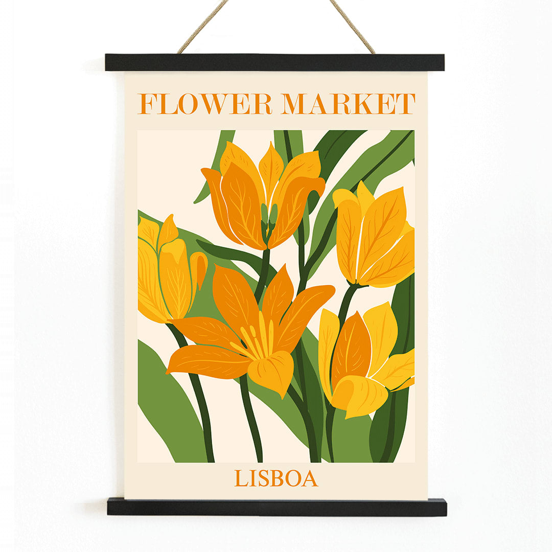 Yellow and orange flowers with green leaves illustrated poster titled Flower Market Lisbon by Moryarty, with wooden magnetic frame on white background