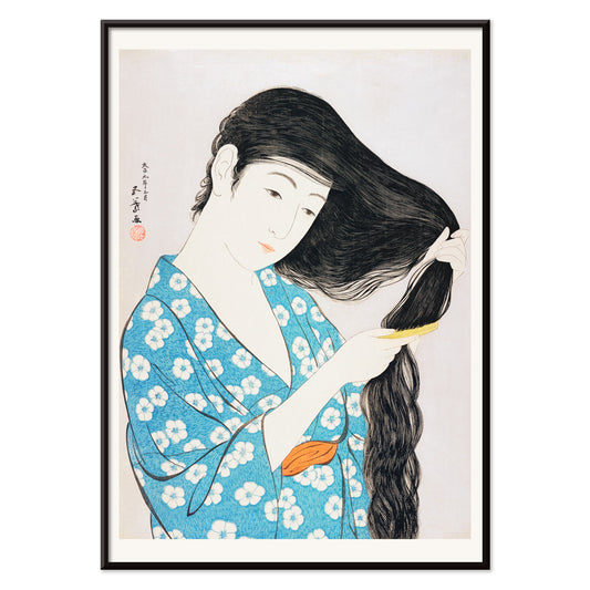 Woman in blue floral kimono combing her long hair artwork Woman Combing Her Hair by Goyo Hashiguchi Japanese art poster, with black aluminium frame on white background