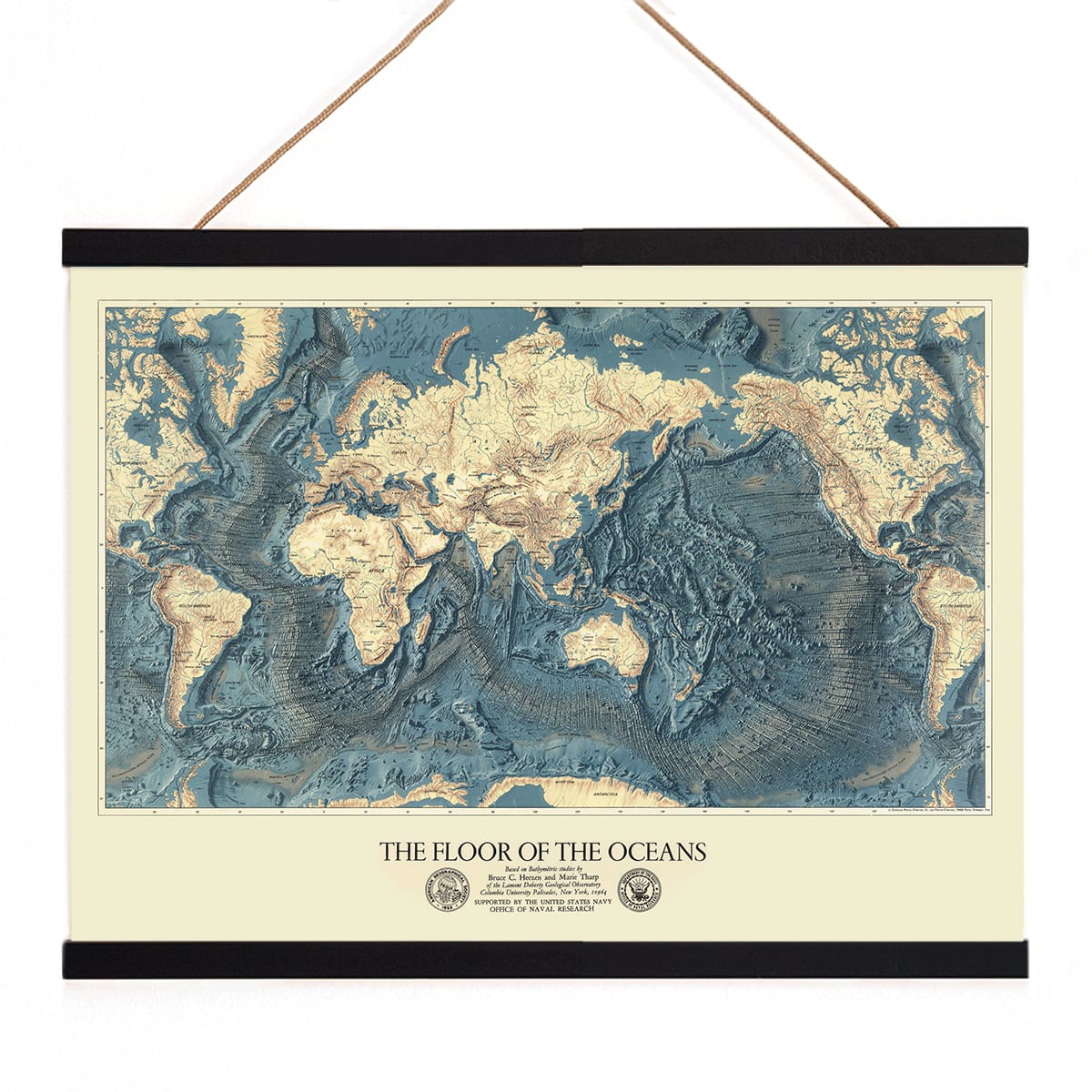 World map artwork showing ocean floors titled The Floor of the Oceans bathymetric map poster, with wooden magnetic frame on white background