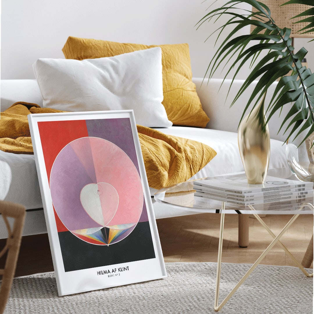 Abstract geometric shapes in pastel and rainbow colors with heart motif poster inspired by Doves by Hilma af Klint, framed and displayed in home decor