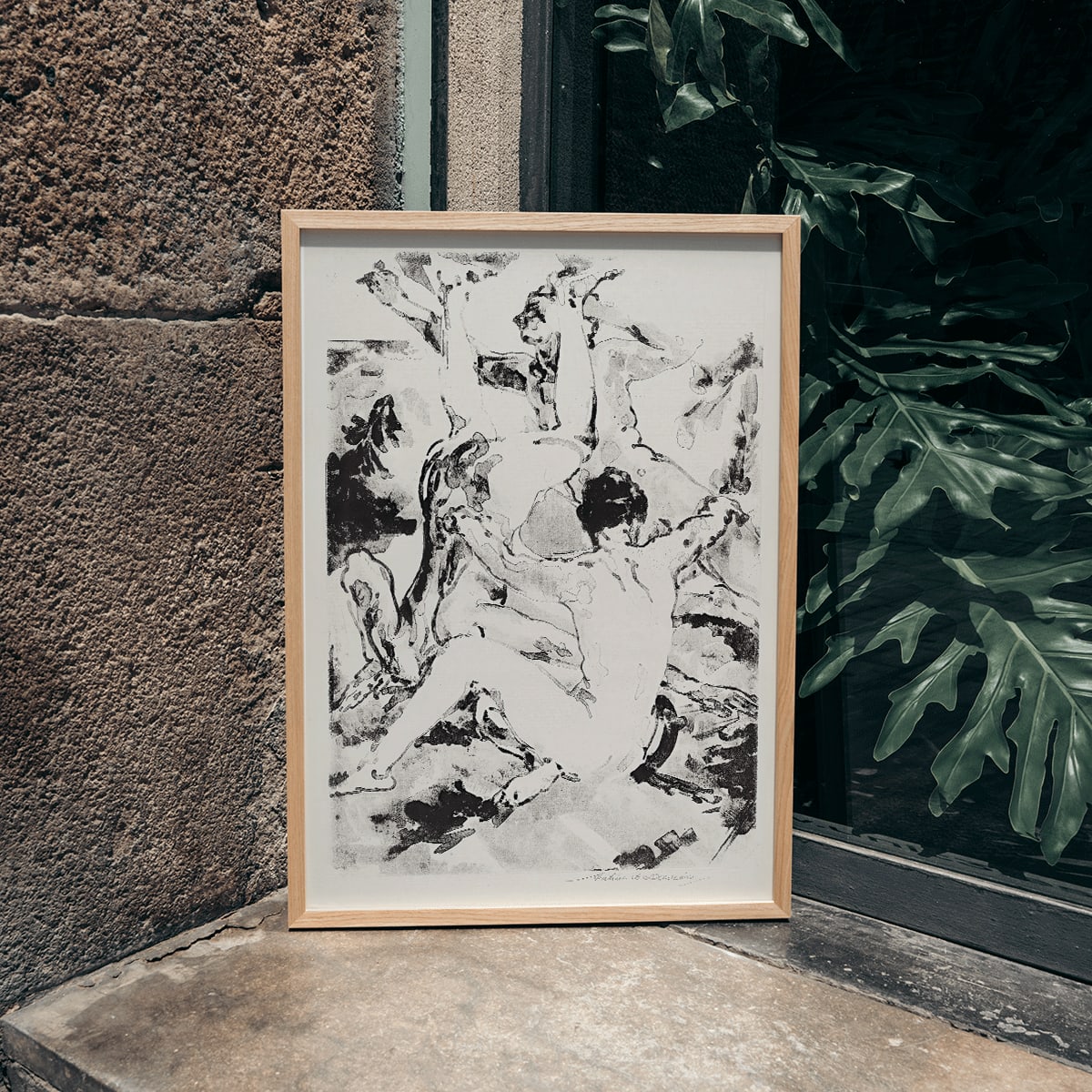 Three acrobats in dynamic abstract black and white style by Arthur Bowen Davies poster depicting figures in motion, framed and displayed in modern living room decor