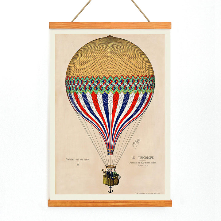 French flag hot air balloon in red white and blue ascending over Paris artwork Le Tricolore by E Hennequin with passengers, with wooden magnetic frame on white background