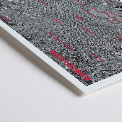 Closeup detail of Moryarty Barcelona satellite city map poster in bold black and white aerial style showing city grid districts landmarks monuments and coastline