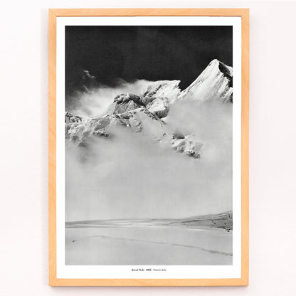 Broad Peak mountain view from Godwin-Austen Glacier snow-covered and obscured by clouds photo by Vittorio Sella, framed and displayed in modern living room decor