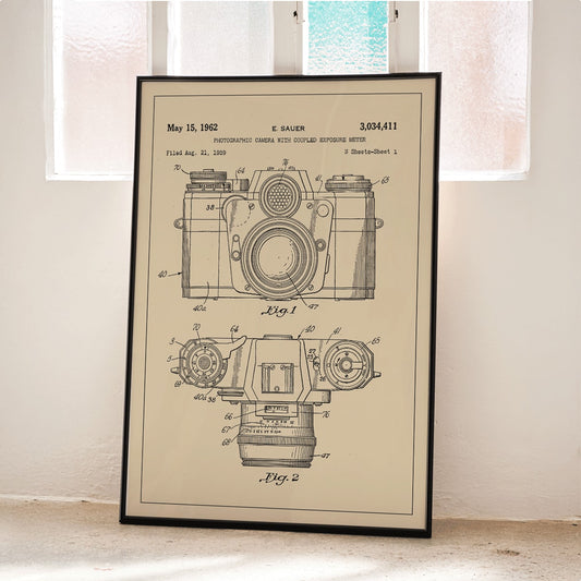 Technical illustration and poster of photographic camera with coupled exposure meter patent by E Sauer showing detailed technical drawings, framed and displayed in home decor
