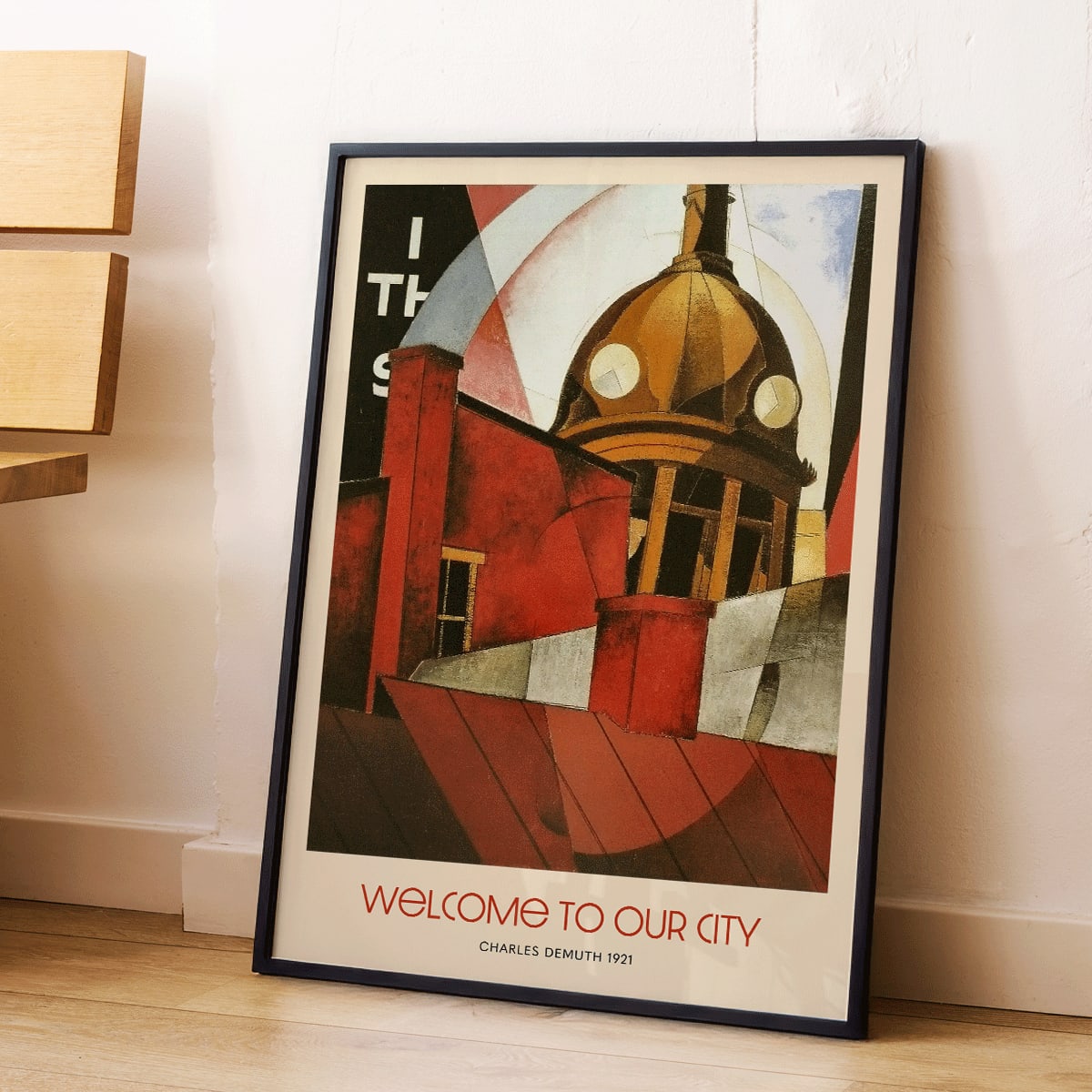 Welcome to Our City by Charles Demuth poster featuring abstract urban architecture and geometric design elements, framed and displayed in modern living room decor