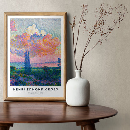 Colorful landscape poster with a vivid pink cloud by Henri Edmond Cross titled The Pink Cloud, framed and displayed in home decor