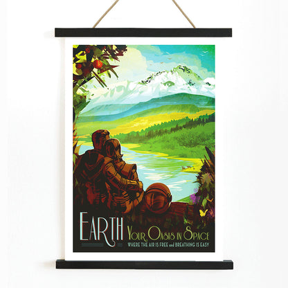 Two people in spacesuits admire a lush green landscape with mountains and a lake Earth Your Oasis in Space by NASA poster artwork, with wooden magnetic frame on white background