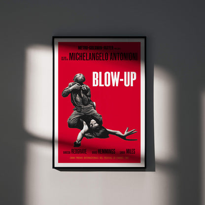 Michelangelo Antonioni Blow Up Movie poster with dramatic black and white photography and vibrant red background, framed and displayed in modern living room decor