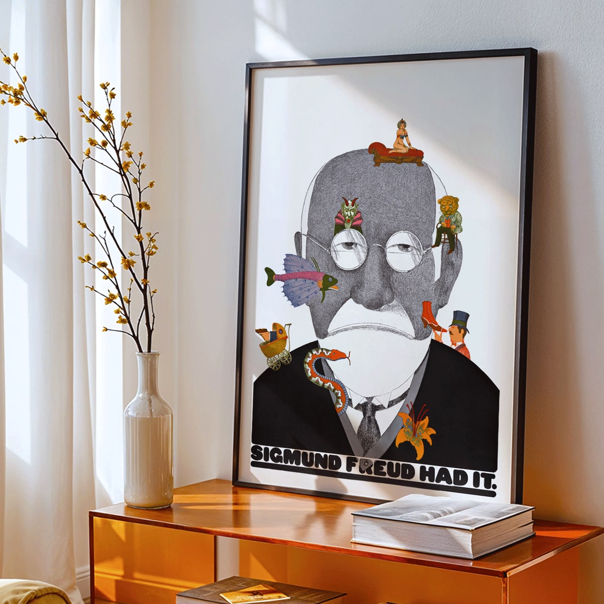 Surreal Sigmund Freud portrait and poster with colorful whimsical illustrations by Seymour Chwast, framed and displayed in modern living room decor