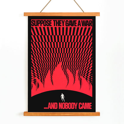 Man on hill facing flames poster by Gary Yanker titled Suppose They Gave a War and Nobody Came Prop art New York, with wooden magnetic frame on white background