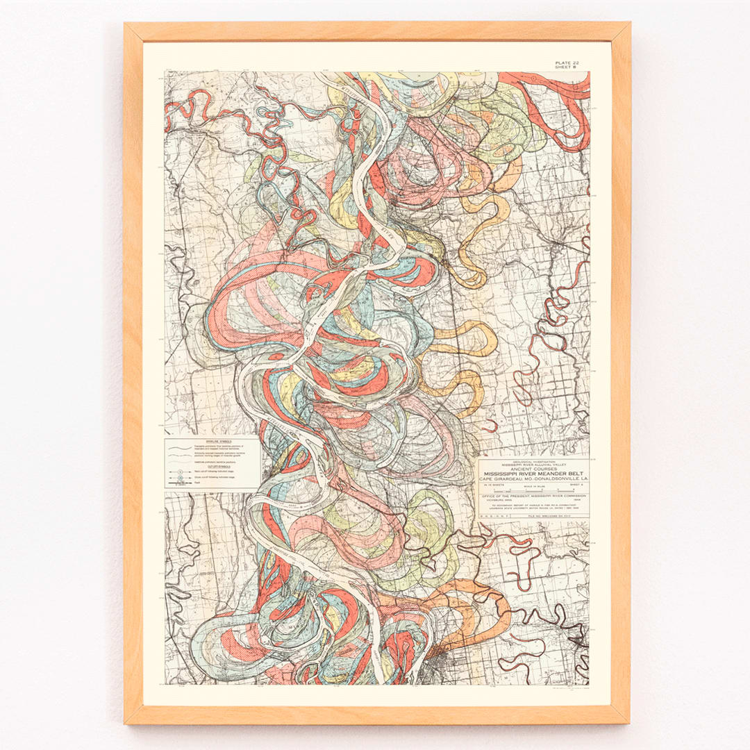 Colorful topographic map poster of the Mississippi River by Harold Fisk titled Ancient Courses of the Mississippi River showing historic colorful swirls and paths, framed and displayed in modern living room decor