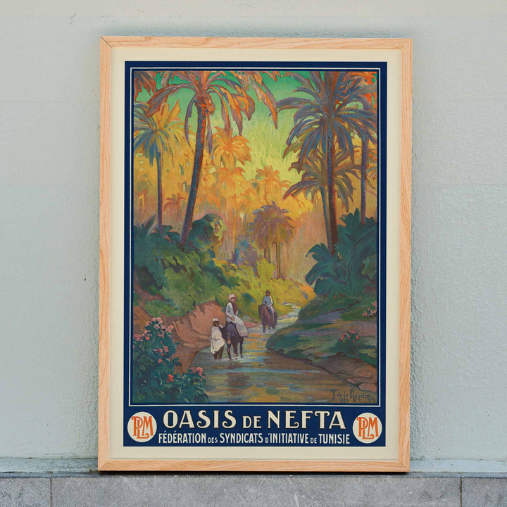 Oasis de Nefta poster by Joseph de La Nézière with lush palm oasis, warm sunset light, figures and winding stream, framed and displayed in home decor