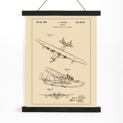 Detailed technical drawing and poster of a seaplane airplane patent by Igor I Sikorsky featuring multiple views and aircraft design sketches, with wooden magnetic frame on white background