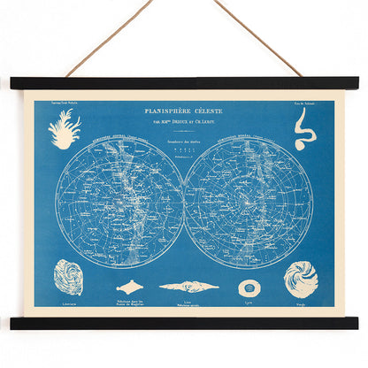 Celestial planisphere star map poster by Claude Joseph Drioux featuring constellations and astronomical illustrations on blue background, with wooden magnetic frame on white background