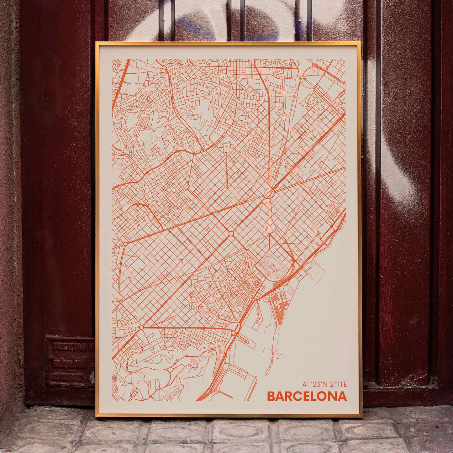 Minimalist map of Barcelona by Moryarty featuring red lines on a beige background poster, framed and displayed in home decor