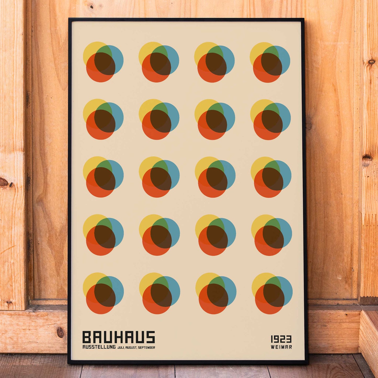 Bauhaus Poster 8 Inspired by the Weimar Exhibition with abstract colorful overlapping circles in a geometric grid pattern, framed and displayed in home decor