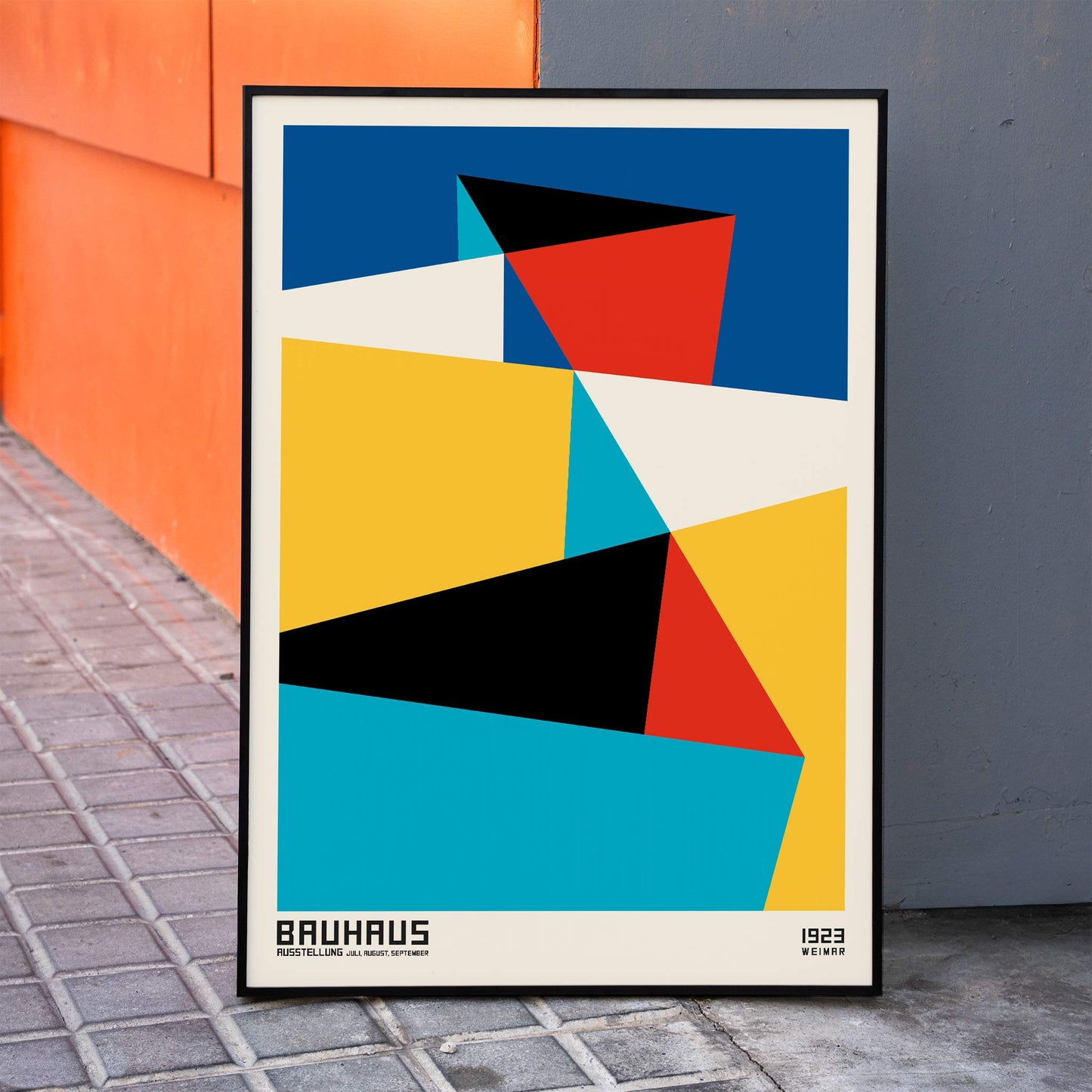 Bauhaus poster 15 by Schlemmer featuring abstract geometric shapes and geometric abstract art in primary colors, framed and displayed in home decor