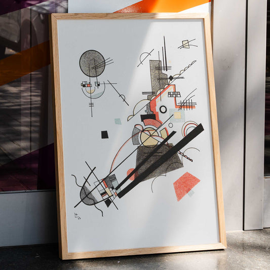 Abstract geometric art poster with intersecting lines and shapes in black red and yellow Fröhlicher Aufstieg by Wassily Kandinsky, framed and displayed in home decor