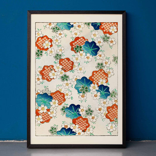 Colorful floral pattern artwork by Watanabe Seitei from Bijutsu Sekai featuring traditional Japanese design with colorful blossoms and leaves on a light background, framed and displayed in home decor