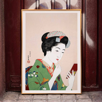 High resolution fine art poster of Japanese woman in kimono applying makeup by Goyo Hashiguchi Woman Applying Rouge, framed and displayed in home decor