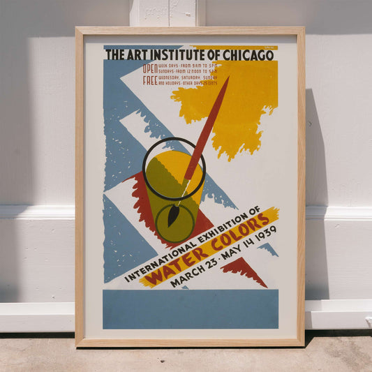 Colorful poster art for International exhibition of water colors by Arlington Gregg featuring paintbrush watercolor palette abstract brush strokes and a paintbrush in a glass, framed and displayed in home decor