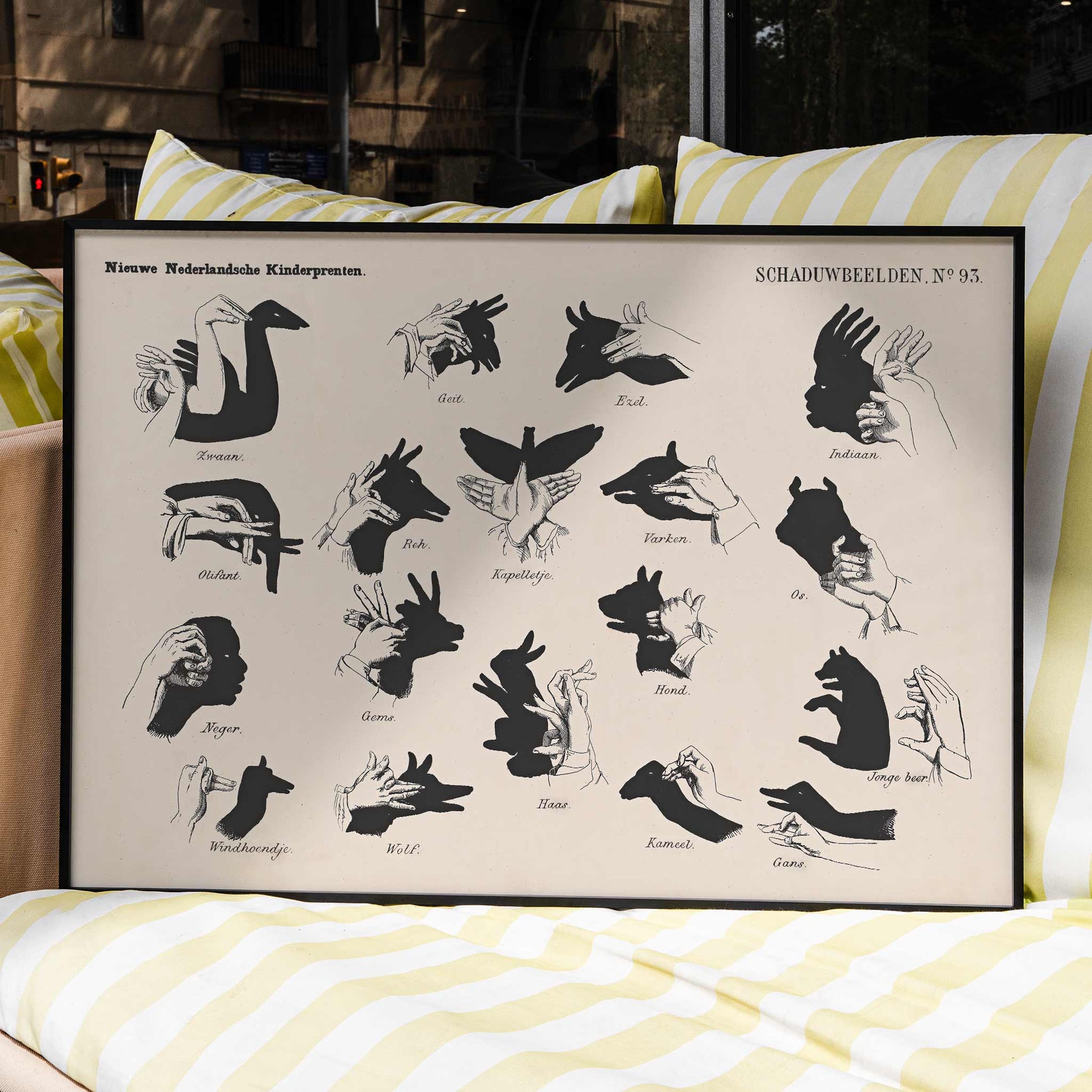 Vintage hand shadow puppet illustrations and animal shapes poster from Shadow Hands by George Lodewijk Funke artwork, framed and displayed in modern living room decor