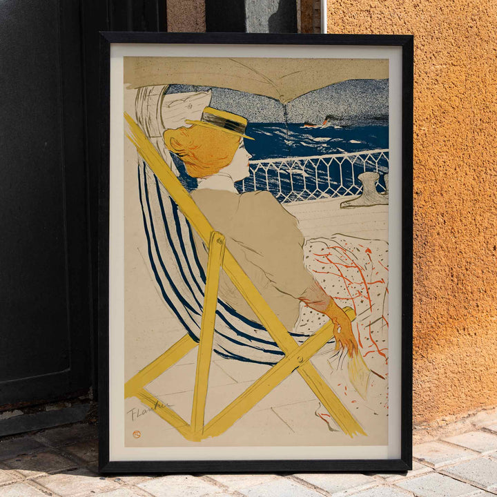 Henri de Toulouse-Lautrec La passagère du 54 poster with seated woman on deck blue sea striped chair and yellow accents, framed and displayed in home decor
