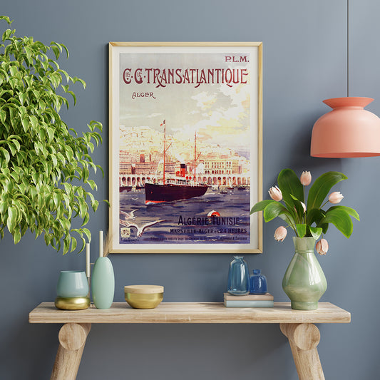 Vintage steamship in Algiers harbor with city buildings travel poster by Fernand Le Quesne Cie Cle Transatlantique, framed and displayed in home decor