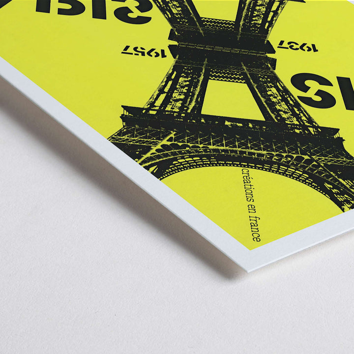 Closeup detail of Roman Cieślewicz Paris-Paris 1937-1957 poster with yellow background black Eiffel Tower and mirrored typography